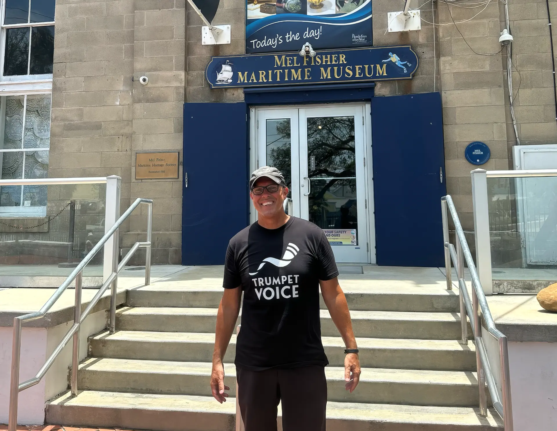 Standing outside the Mel Fisher Maritime Museum in Key West wearing a Trumpet Voice shirt